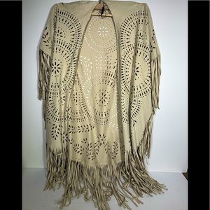 Tan/cream poncho with cutouts on size fits all